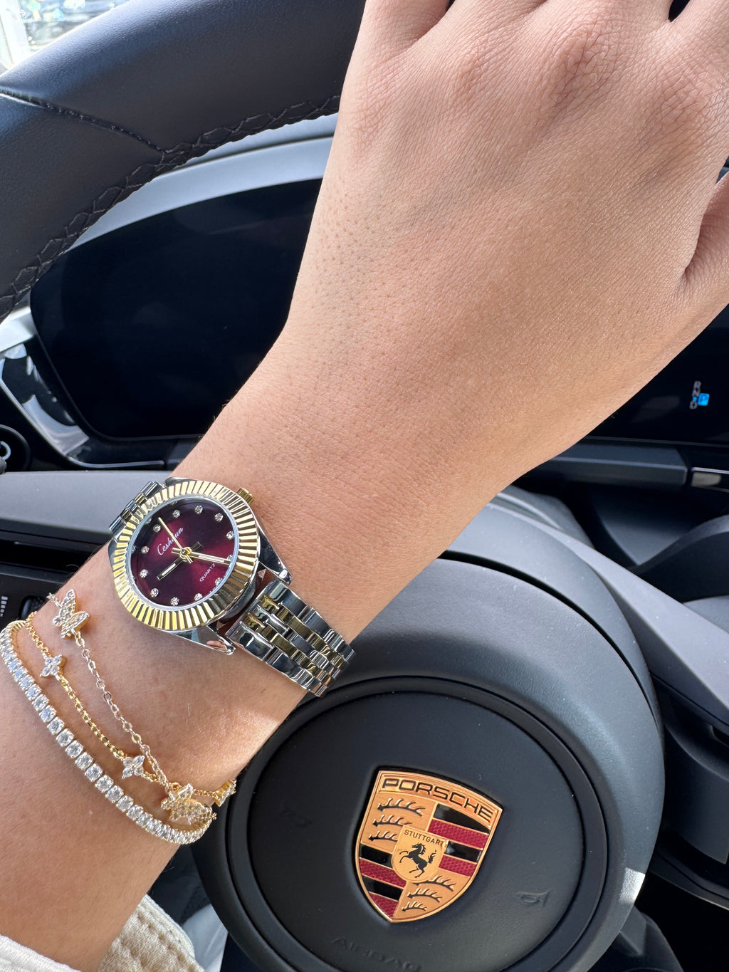 Roly or et argent fond bordeaux