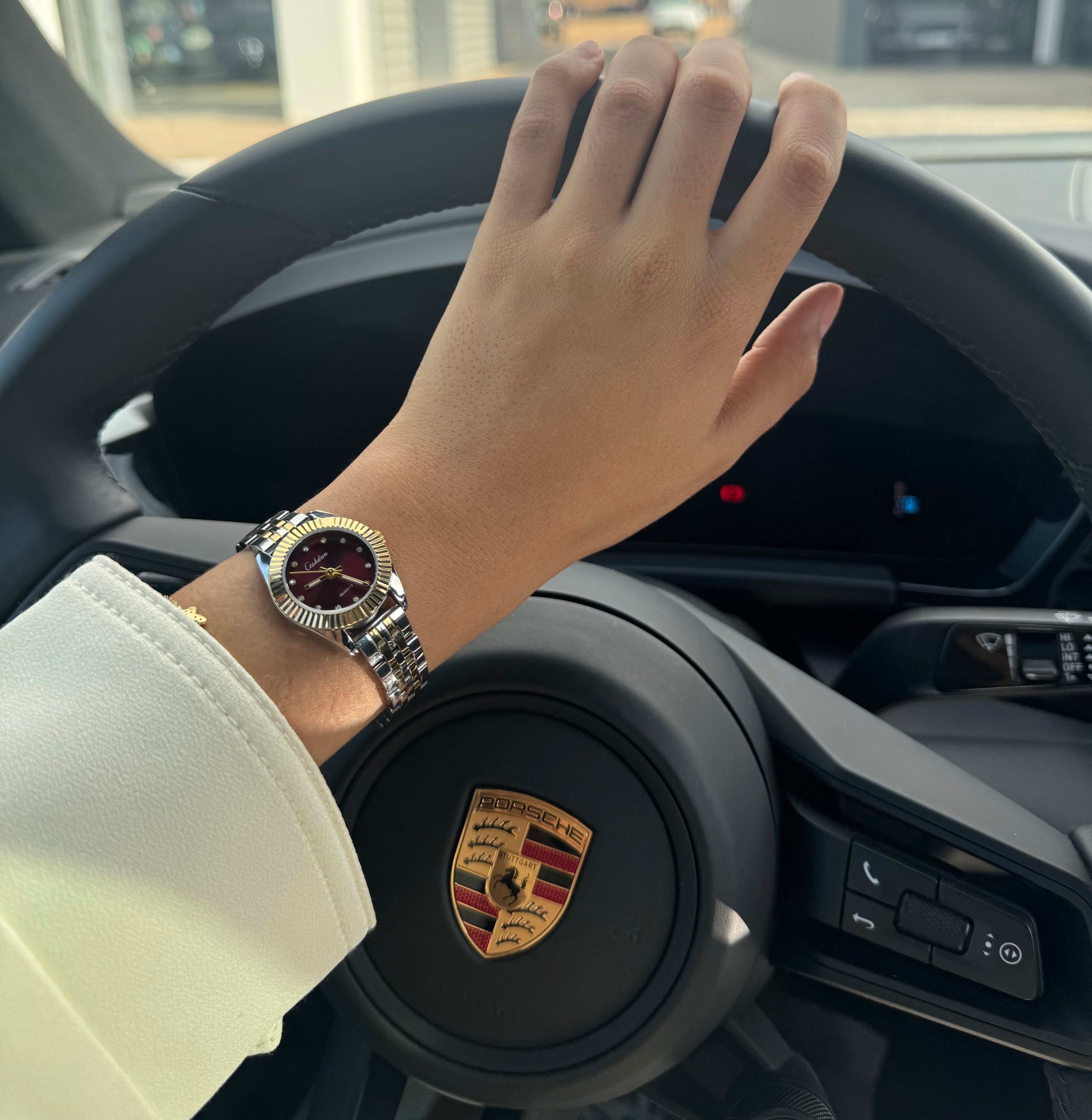 Roly or et argent fond bordeaux