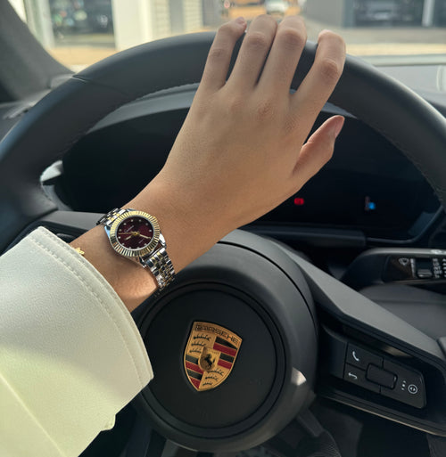 Roly or et argent fond bordeaux