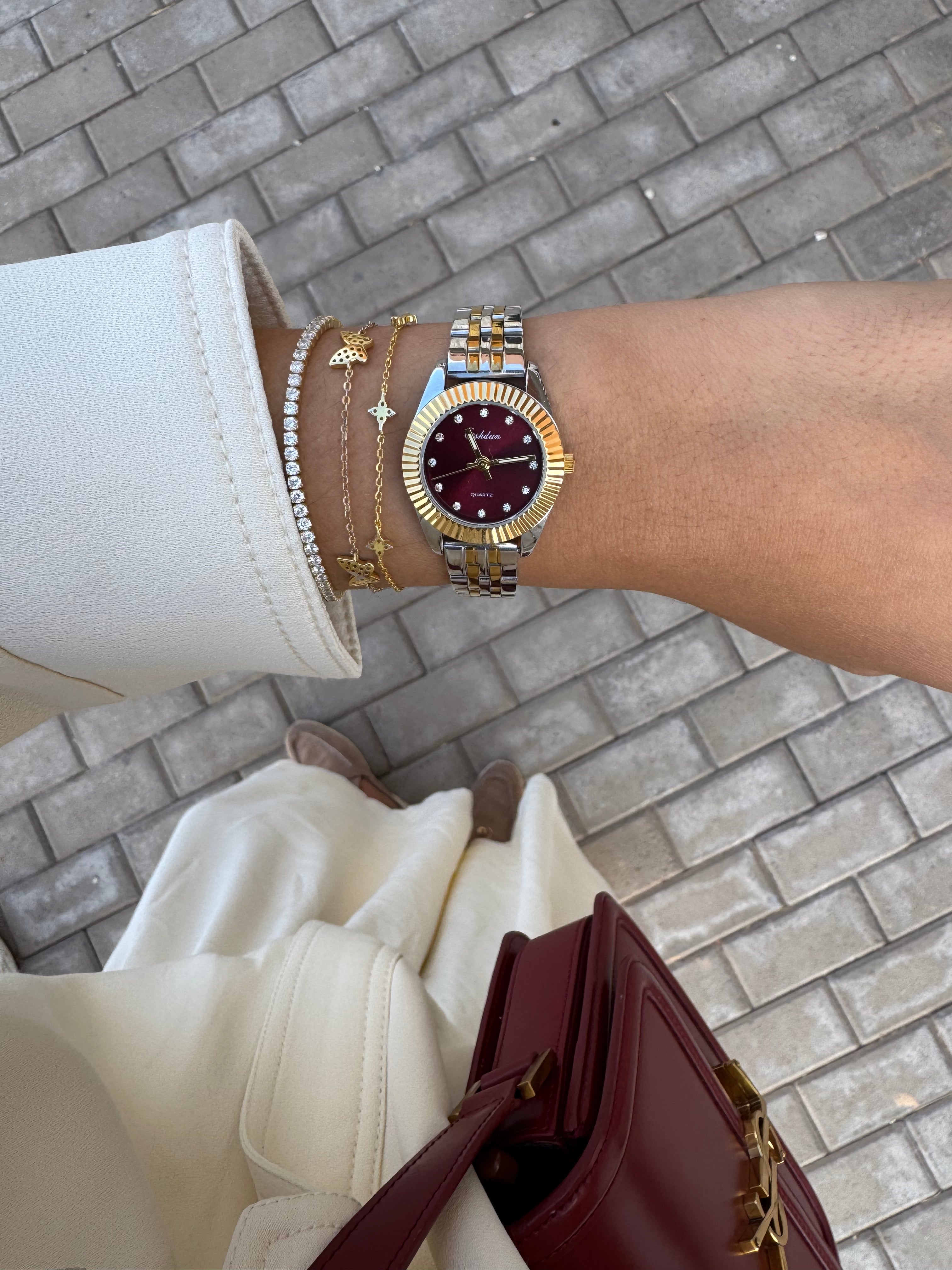 Roly or et argent fond bordeaux